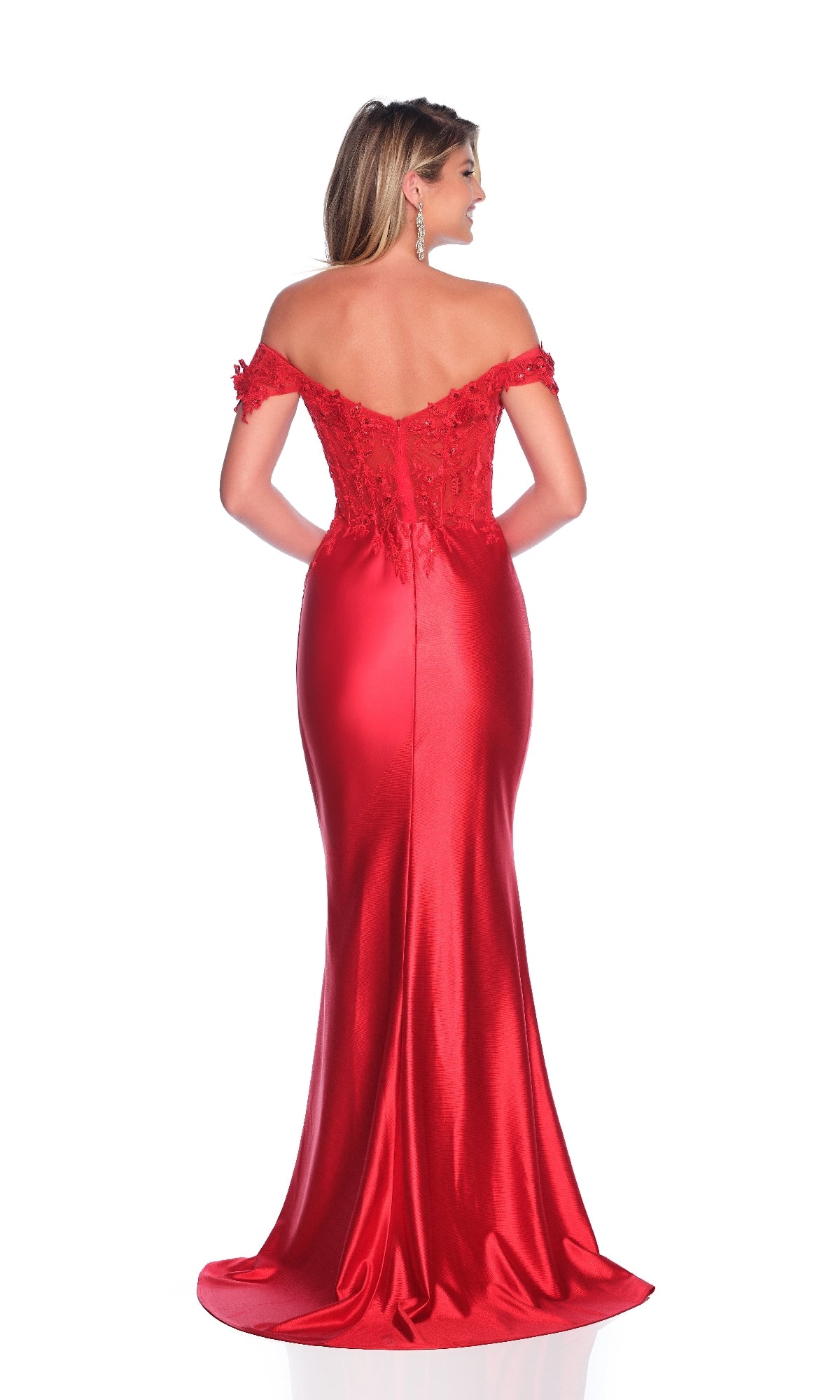 A woman poses with her back to the camera against a white background, wearing the Dave & Johnny 11907 off-shoulder red prom dress featuring a floor-length skirt and lace-detailed bodice.